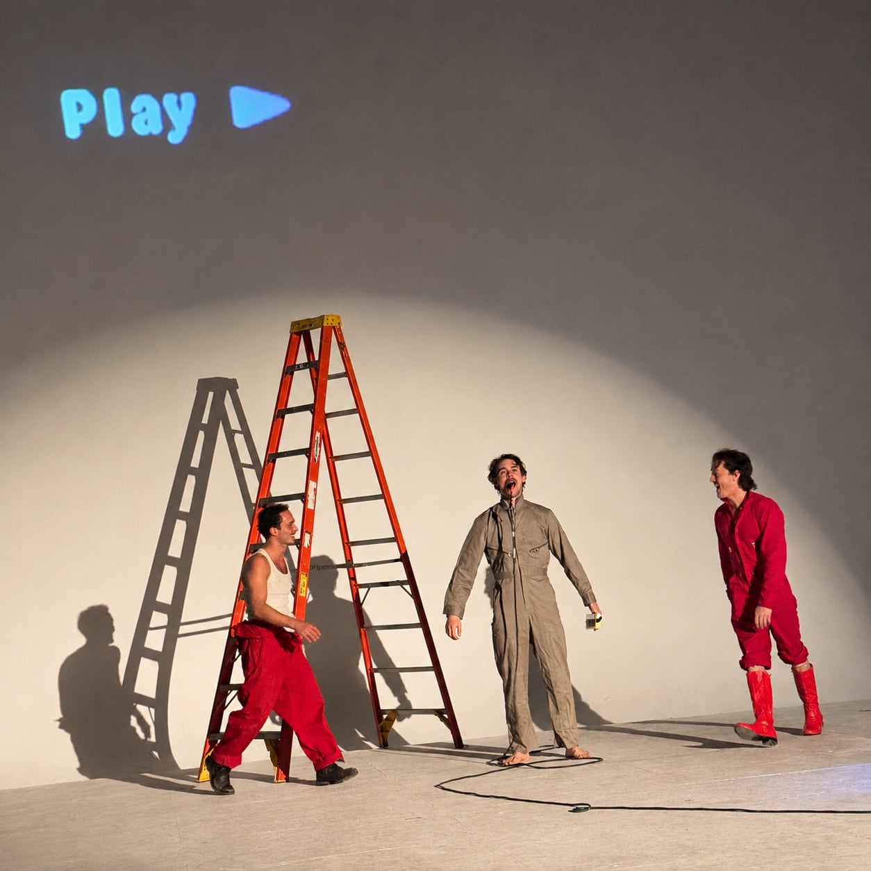 Three Filmshow performers on stage.