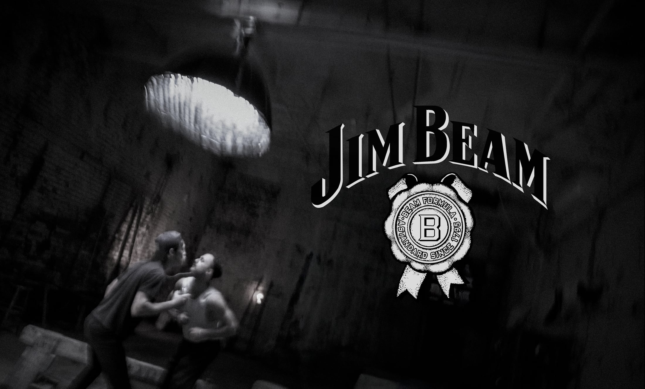 Black-and-white Jim Beam commercial still in an alley.
