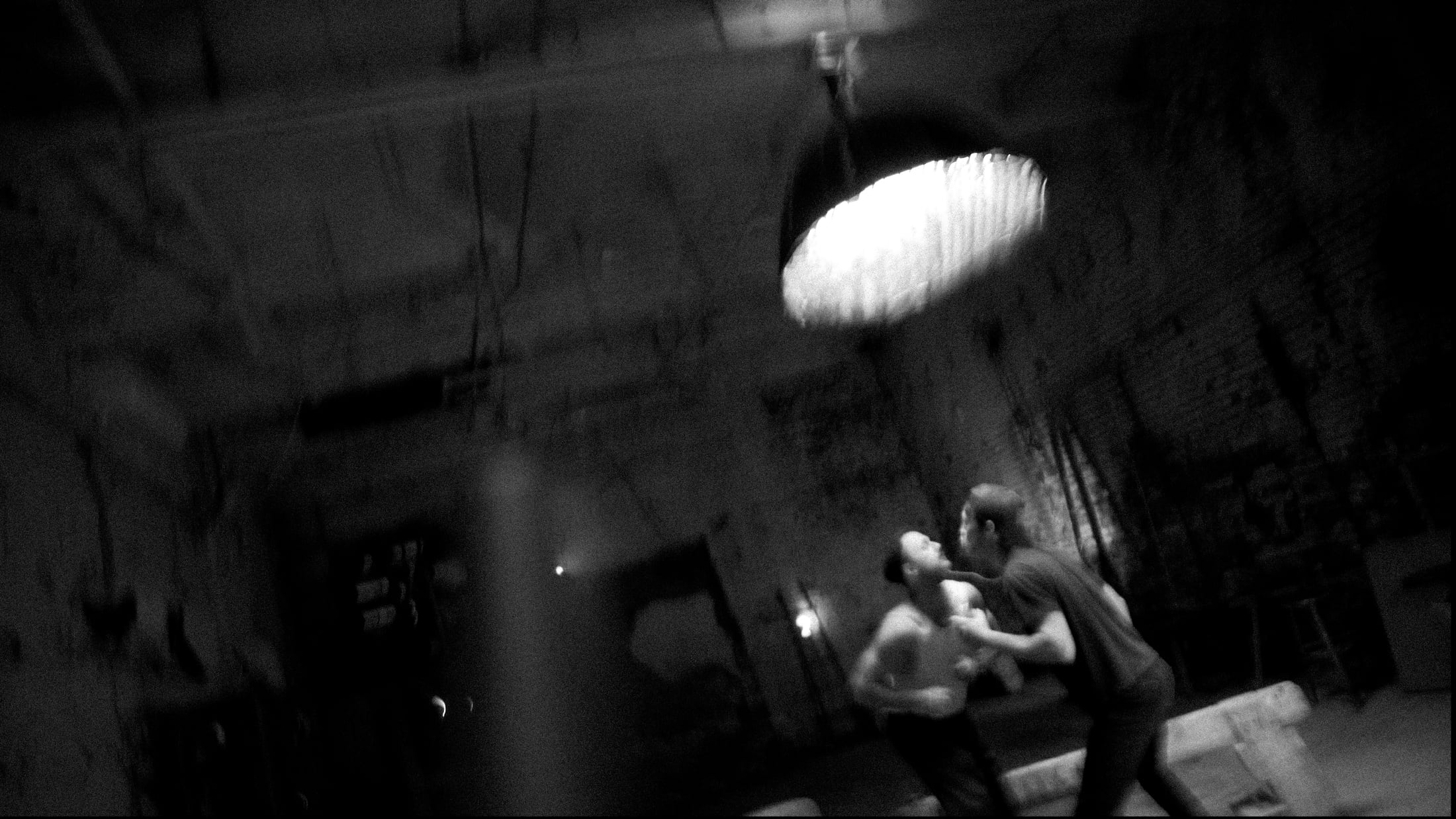 Black-and-white Jim Beam still with two performers.